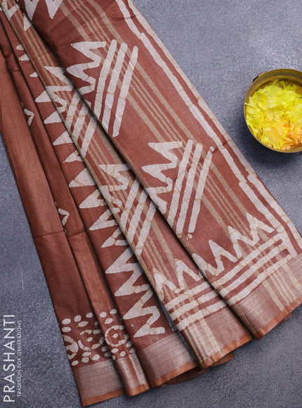 Linen cotton saree brown shade with allover batik butta prints and silver zari woven border