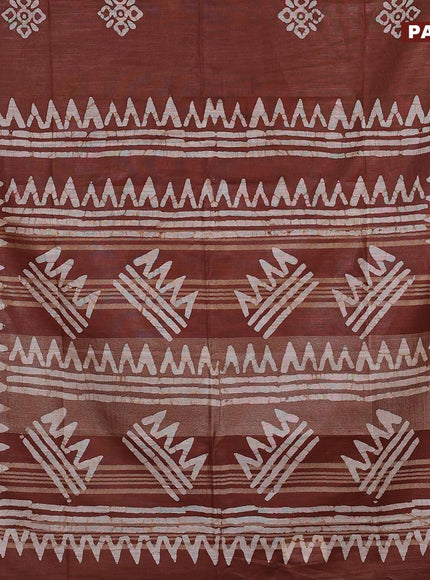 Linen cotton saree brown shade with allover batik butta prints and silver zari woven border