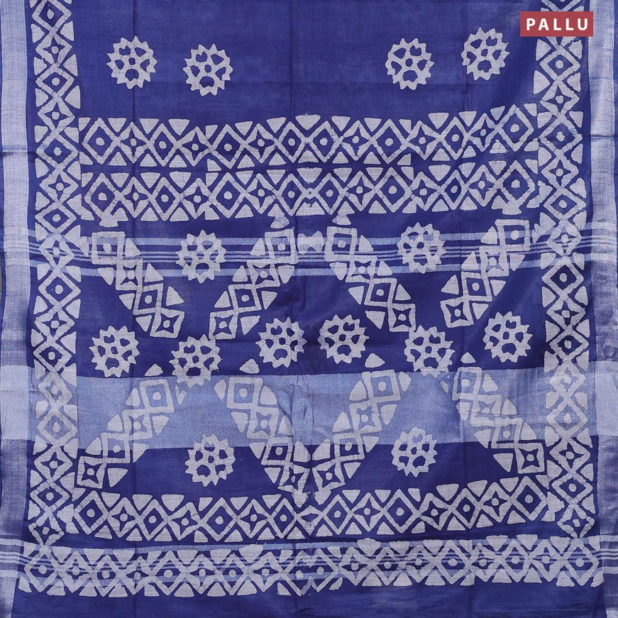 Linen cotton saree blue with allover batik butta prints and silver zari woven border