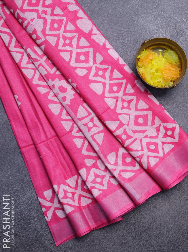 Linen cotton saree pink with allover batik butta prints and silver zari woven border