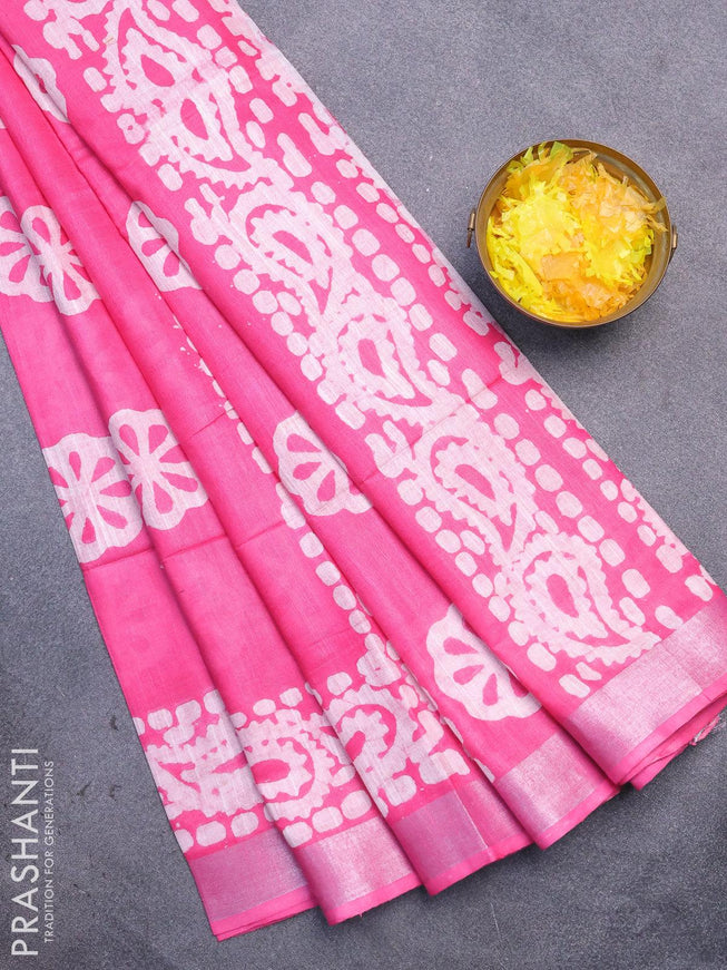 Linen cotton saree pink with allover batik butta prints and silver zari woven border