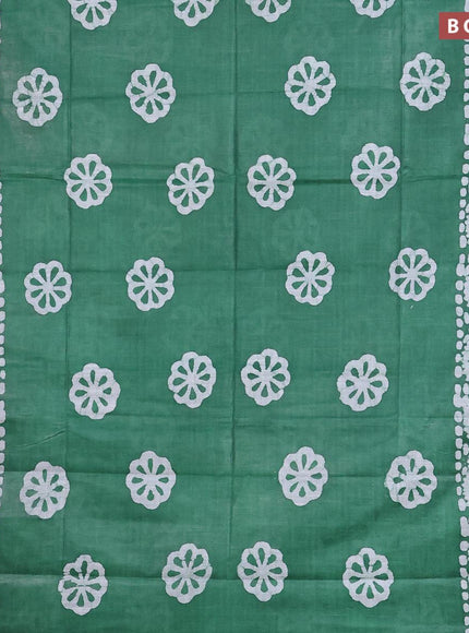 Linen cotton saree green with allover batik butta prints and silver zari woven border