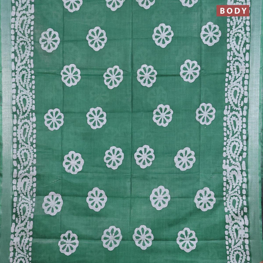 Linen cotton saree green with allover batik butta prints and silver zari woven border