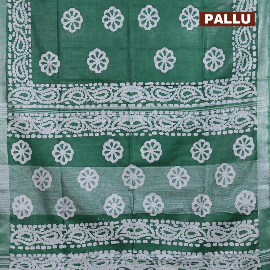 Linen cotton saree green with allover batik butta prints and silver zari woven border