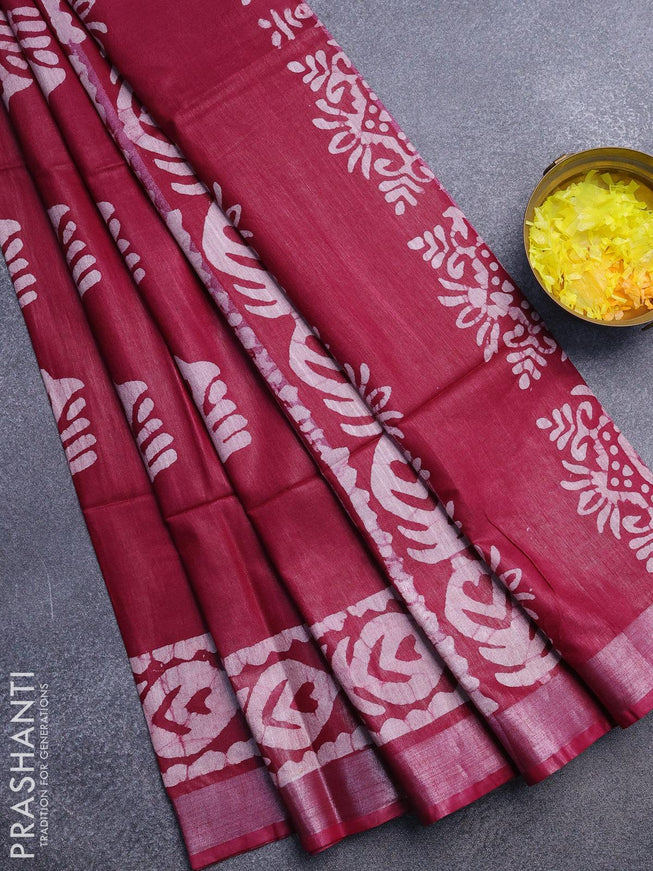 Linen cotton saree magenta pink with allover batik butta prints and silver zari woven border