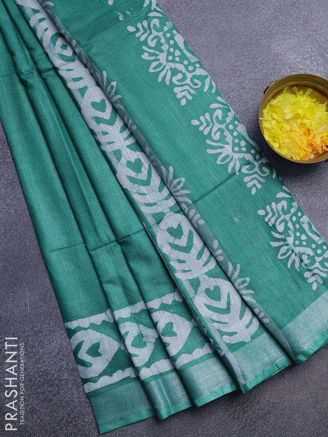 Linen cotton saree green with allover batik butta prints and silver zari woven border