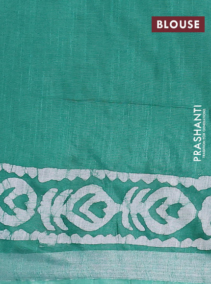 Linen cotton saree green with allover batik butta prints and silver zari woven border