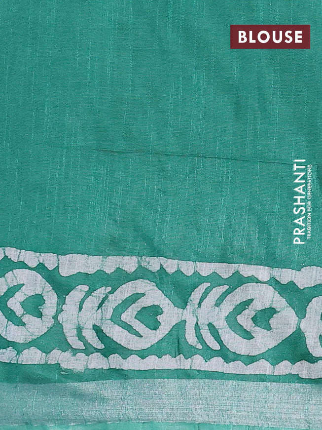 Linen cotton saree green with allover batik butta prints and silver zari woven border