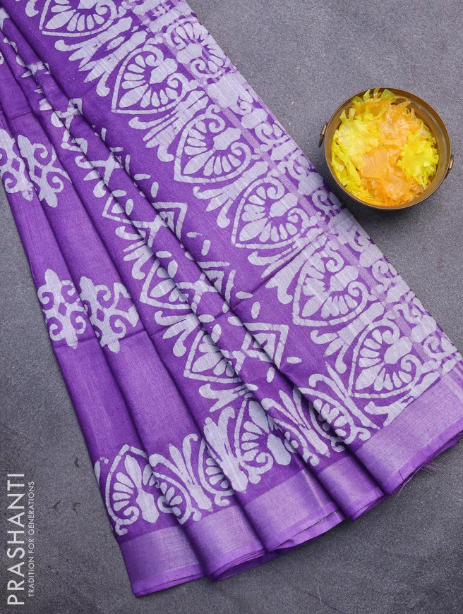 Linen cotton saree lavender shade with allover batik butta prints and silver zari woven border