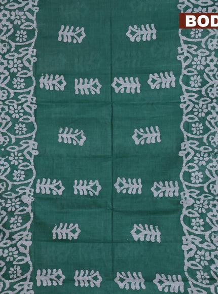 Linen cotton saree green with allover batik butta prints and silver zari woven border