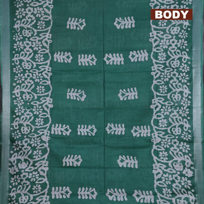 Linen cotton saree green with allover batik butta prints and silver zari woven border