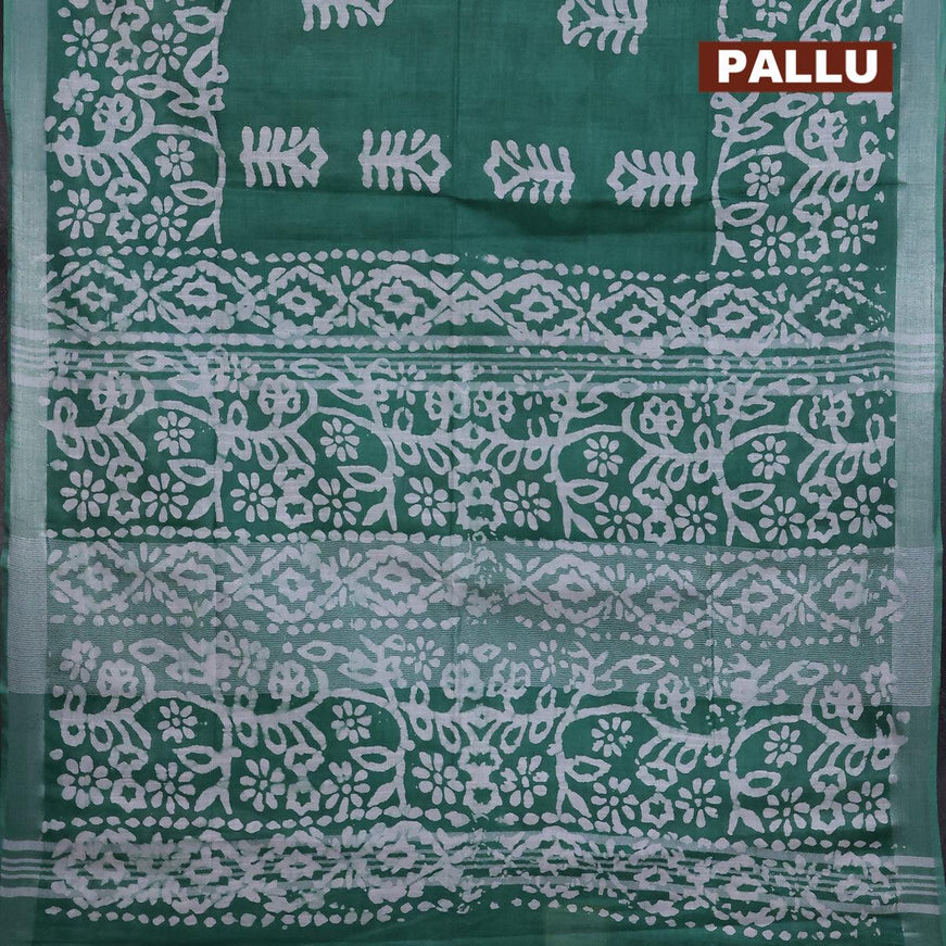 Linen cotton saree green with allover batik butta prints and silver zari woven border