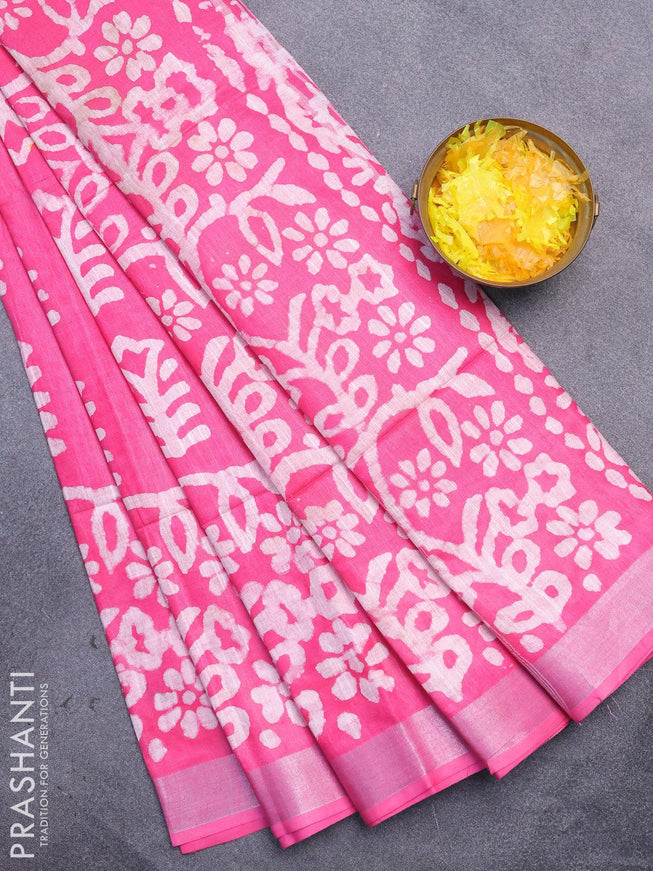 Linen cotton saree pink with allover batik butta prints and silver zari woven border