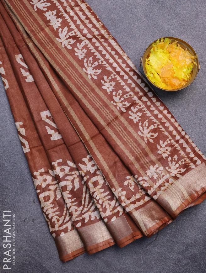 Linen cotton saree brown shade with allover batik butta prints and silver zari woven border