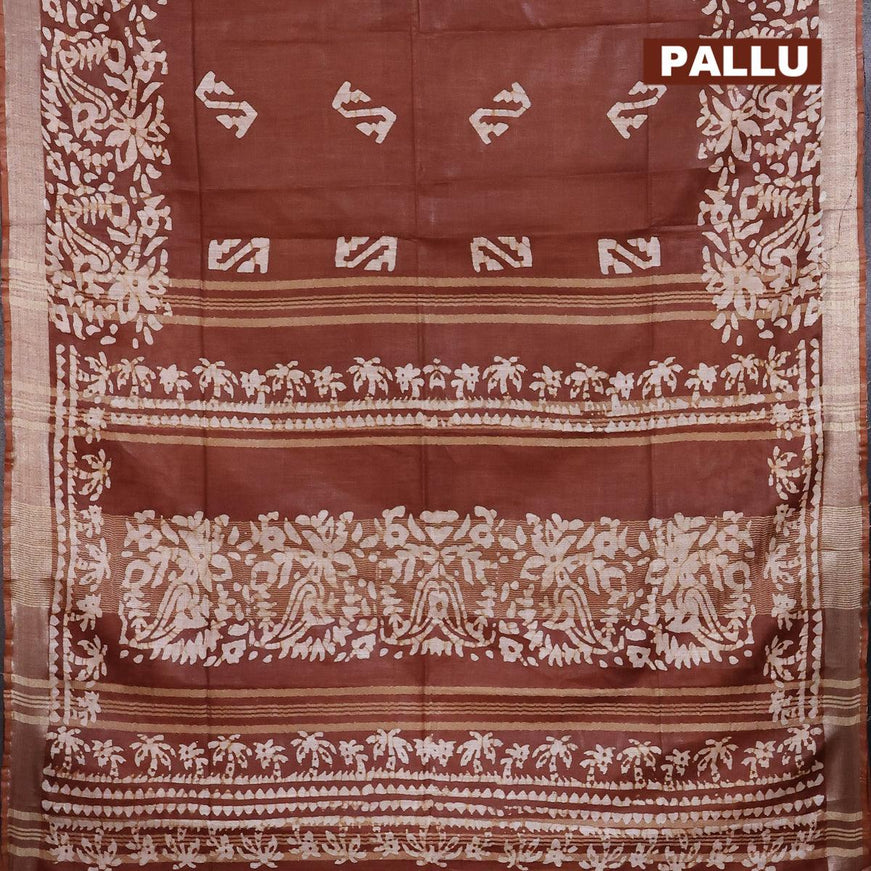 Linen cotton saree brown shade with allover batik butta prints and silver zari woven border