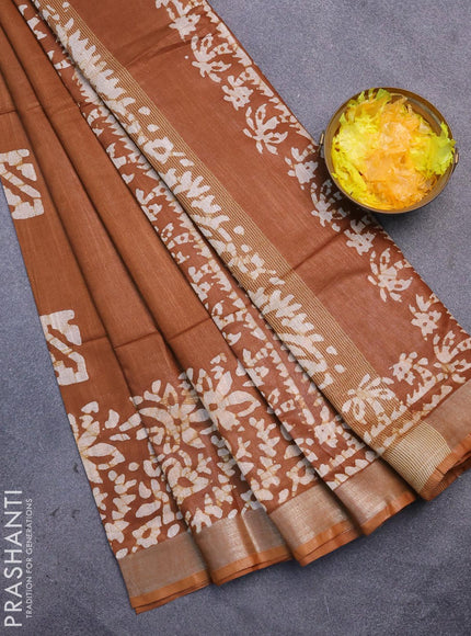 Linen cotton saree brown shade with allover batik butta prints and silver zari woven border