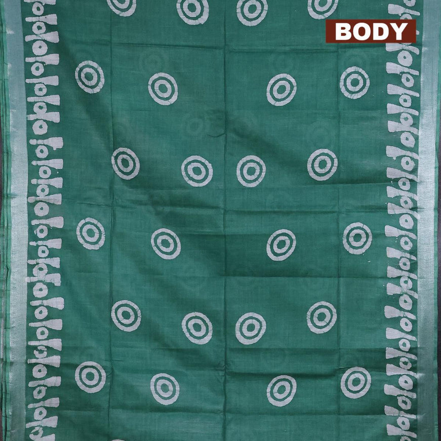 Linen cotton saree green with allover batik butta prints and silver zari woven border