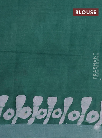 Linen cotton saree green with allover batik butta prints and silver zari woven border