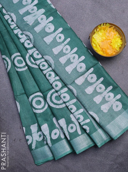 Linen cotton saree green with allover batik butta prints and silver zari woven border