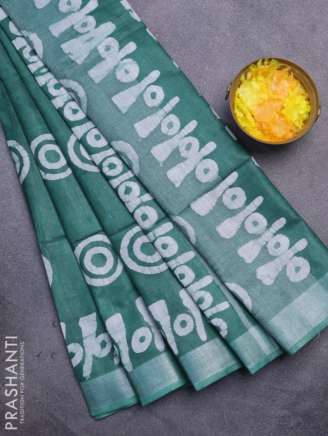 Linen cotton saree green with allover batik butta prints and silver zari woven border