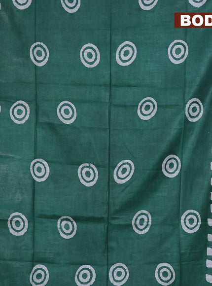 Linen cotton saree green with allover batik butta prints and silver zari woven border