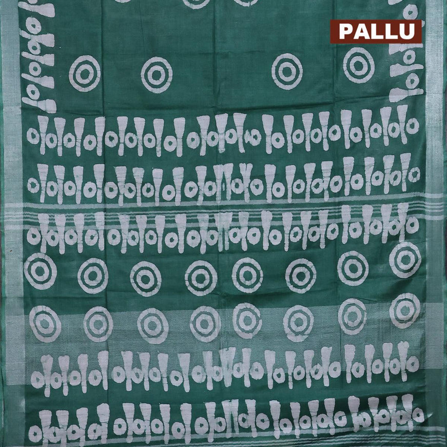 Linen cotton saree green with allover batik butta prints and silver zari woven border