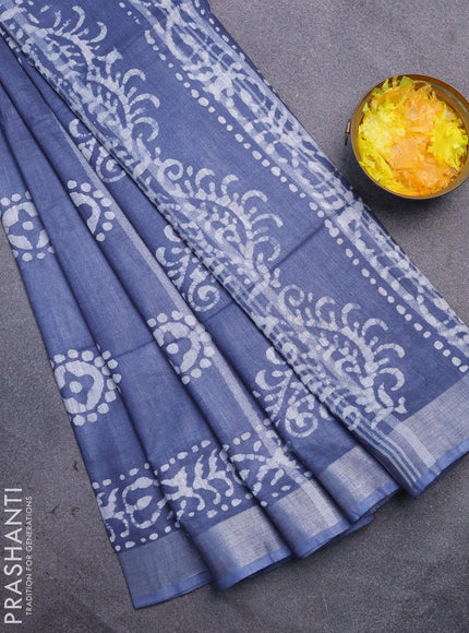 Linen cotton saree grey with allover batik butta prints and silver zari woven border