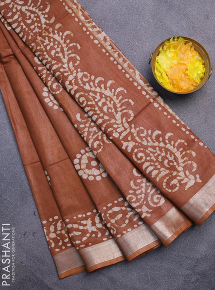 Linen cotton saree brown shade with allover batik butta prints and silver zari woven border