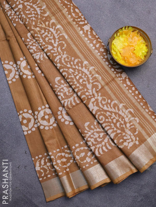 Linen cotton saree dark khaki shade with allover batik butta prints and silver zari woven border