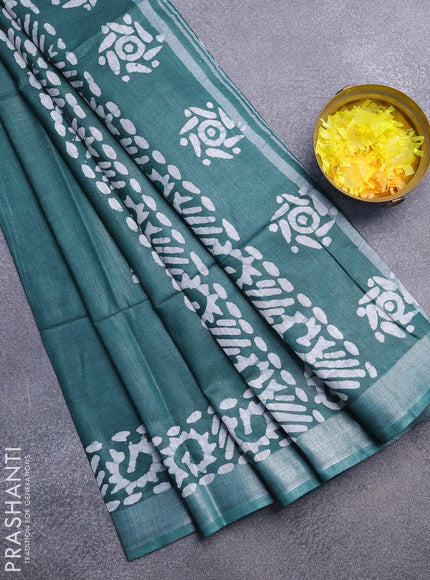 Linen cotton saree green with allover batik butta prints and silver zari woven border