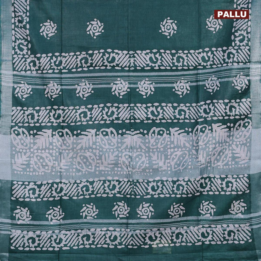 Linen cotton saree green with allover batik butta prints and silver zari woven border