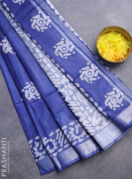 Linen cotton saree blue with allover batik butta prints and silver zari woven border