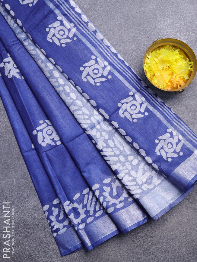 Linen cotton saree blue with allover batik butta prints and silver zari woven border