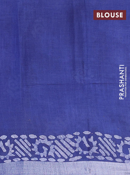 Linen cotton saree blue with allover batik butta prints and silver zari woven border