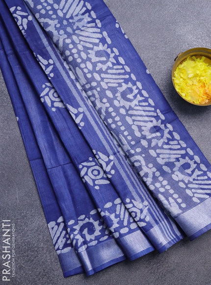 Linen cotton saree blue with allover batik butta prints and silver zari woven border