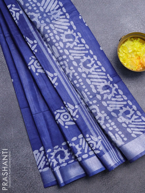 Linen cotton saree blue with allover batik butta prints and silver zari woven border