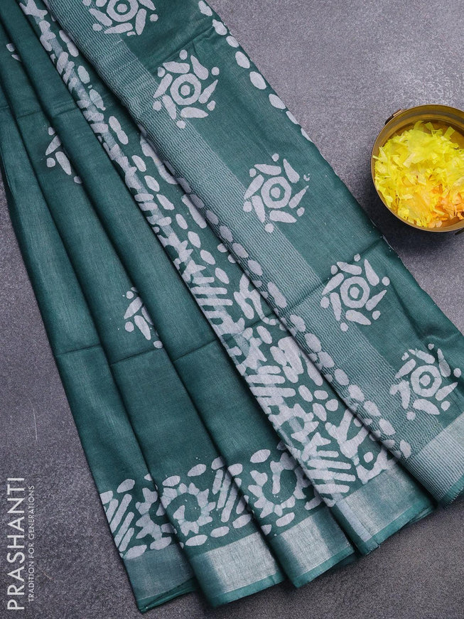 Linen cotton saree green with allover batik butta prints and silver zari woven border