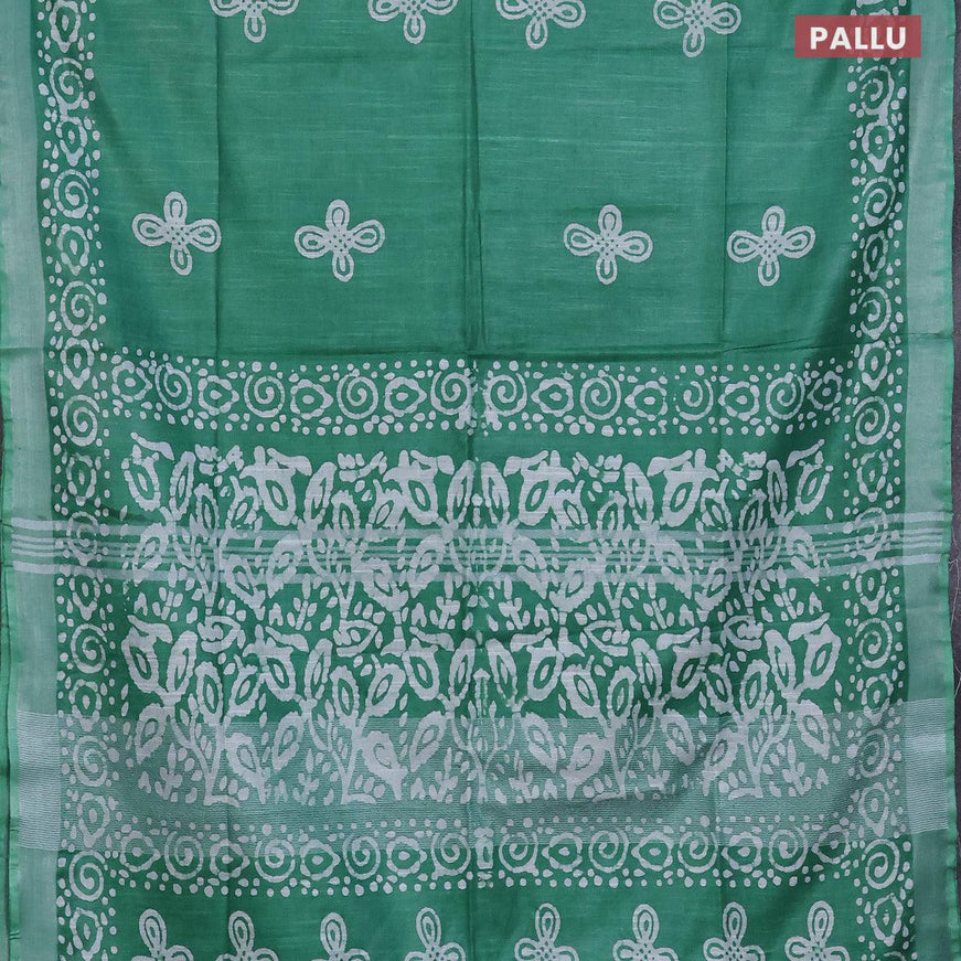 Linen cotton saree green with allover batik butta prints and silver zari woven border