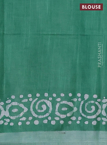 Linen cotton saree green with allover batik butta prints and silver zari woven border