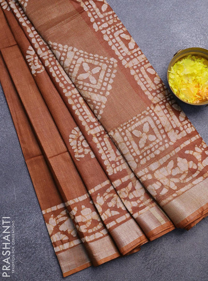 Linen cotton saree brown shade with allover batik butta prints and silver zari woven border