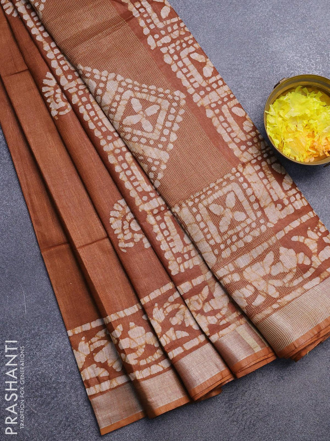 Linen cotton saree brown shade with allover batik butta prints and silver zari woven border