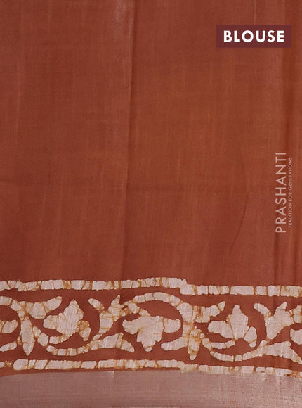 Linen cotton saree brown shade with allover batik butta prints and silver zari woven border