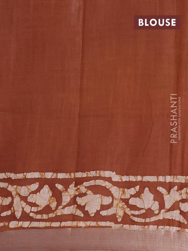 Linen cotton saree brown shade with allover batik butta prints and silver zari woven border