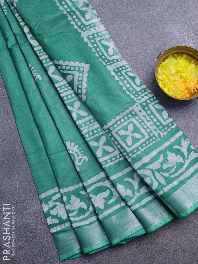 Linen cotton saree green with allover batik butta prints and silver zari woven border