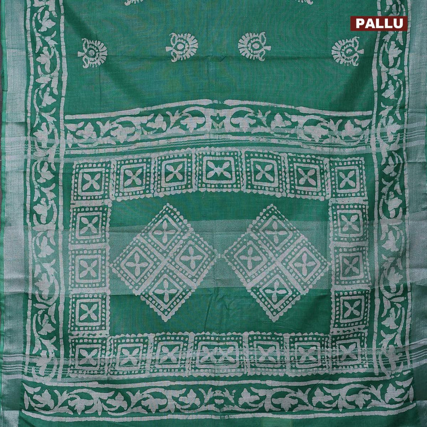 Linen cotton saree green with allover batik butta prints and silver zari woven border