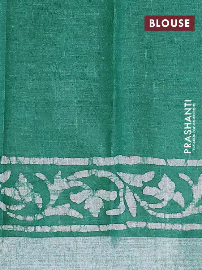 Linen cotton saree green with allover batik butta prints and silver zari woven border