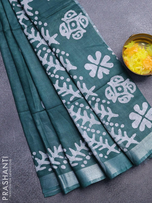 Linen cotton saree dark green with allover batik butta prints and silver zari woven border