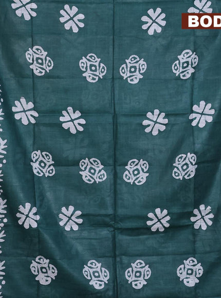 Linen cotton saree dark green with allover batik butta prints and silver zari woven border