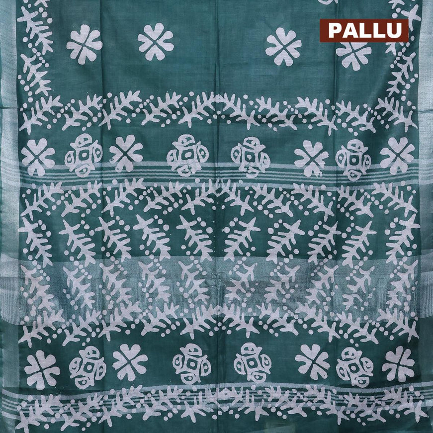 Linen cotton saree dark green with allover batik butta prints and silver zari woven border