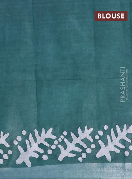 Linen cotton saree dark green with allover batik butta prints and silver zari woven border